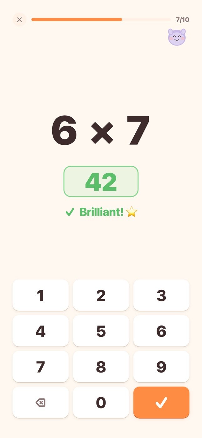 A practice question, six times seven, answered correctly on the number pad